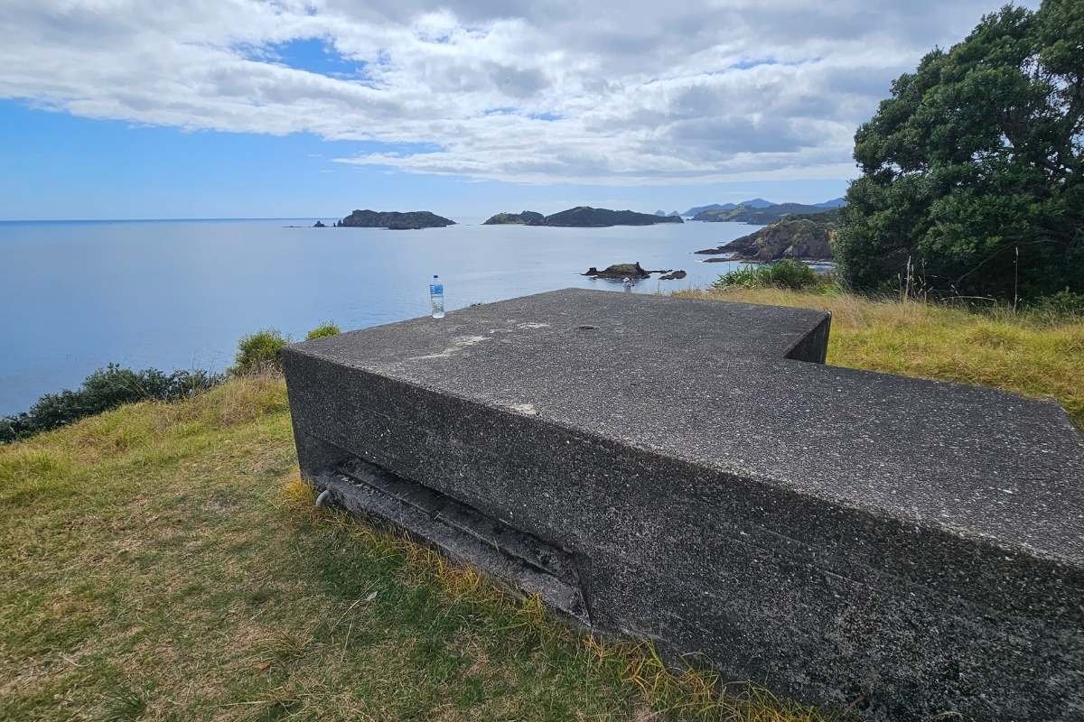 WW2 concrete observation bunker on hilltop with panoramic island
views
