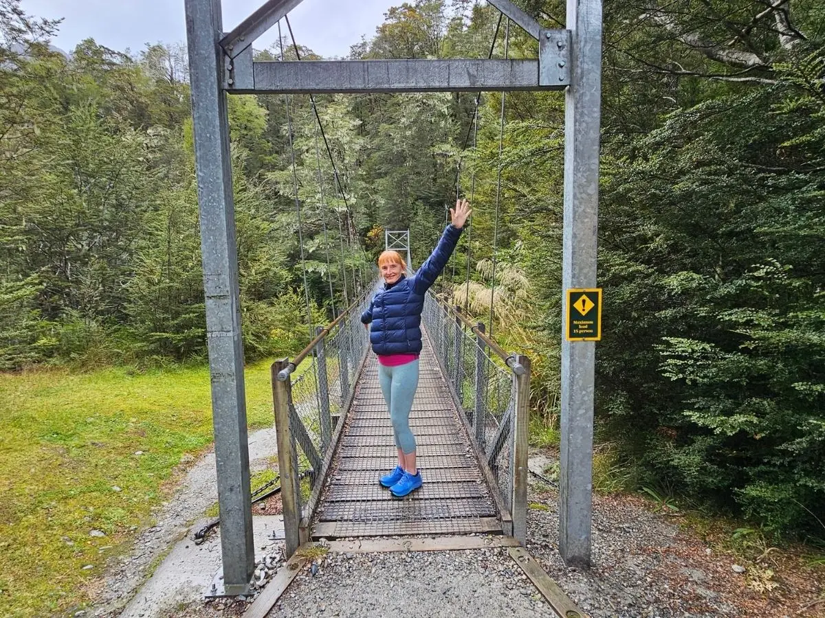 Sandra on the swing bridge at the start of the Routeburn Nature Walk, Glenorchy