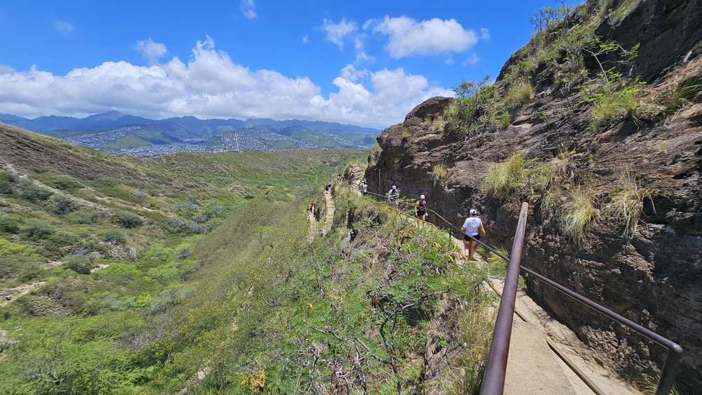 Walking through the tunnel at the base of the Diamond Head crater trail